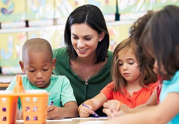 Adult and young learners in a classroom