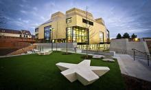 View of University of Worcester library, known as the Hive withits gold coloured roof.